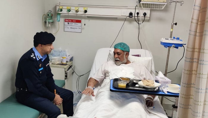 DIG Headquarters/ Security Muhammad Javad Tariq (left) meets SP (Security Operations) Hakeem Khan at Kulsum International Hospital on December 16, 2024. — Facebook@islamabadpolice