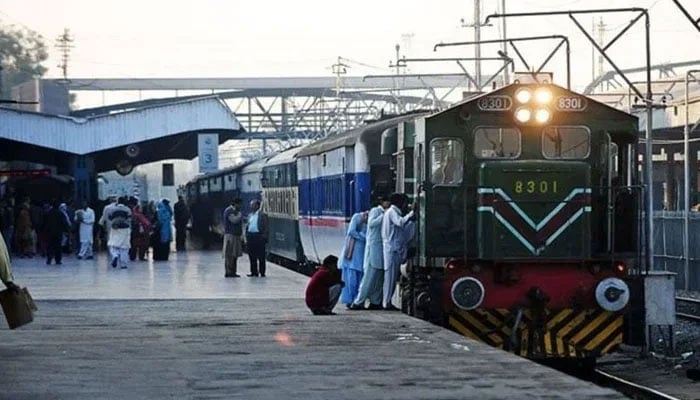 A representational image showing a passenger train at a railway station. — AFP/File