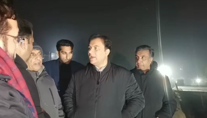 Chairman of the Capital Development Authority (CDA), Muhammad Ali Randhawa (2nd right) is being briefed about the progress of the Jinnah Avenue Interchange underpass construction on December 18, 2024. — Screengrab via Facebook@cda.isb.pk