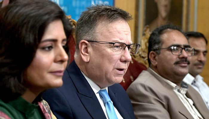 Poland’s Ambassador Maciej Pisarski (centre) addresses a press conference at the National Press Club. — APP/File