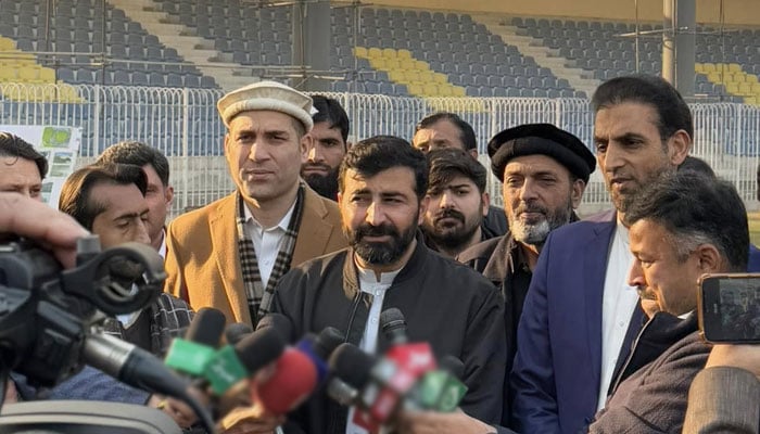 KP Minister for Sports and Youth Affairs Syed Fakhar Jahan (centre) talks to reporters during a visit to Arbab Niaz Cricket Stadium on December 20, 2024. — Facebook@FakharJehanPTI