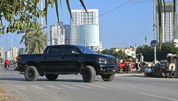 A  pick-up truck locally known as Dala parked at a street in Karachi on November 12, 2024. — AFP