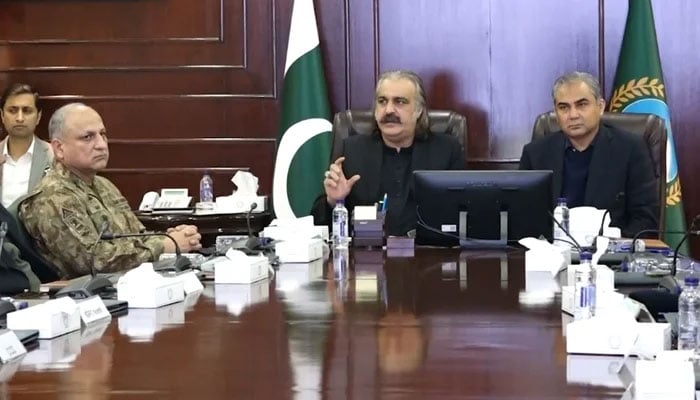 Khyber Pakhtunkhwa Chief Minister Ali Amin Gandapur (centre) chairs the Apex Committee in Peshawar, on December 20, 2024. — Screengrab via YouTube/Geo News