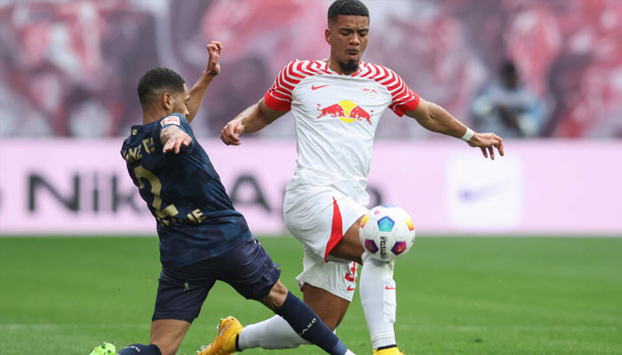 RB Leipzig defender Benjamin Henrichs (right) in action. —AFP/FIle