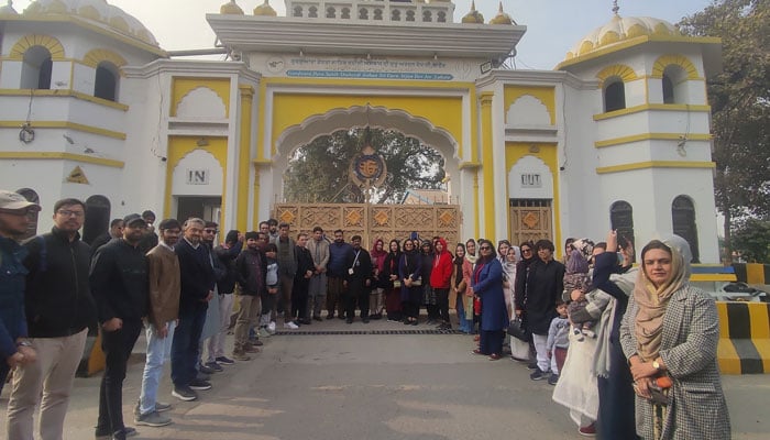 Tourists pose for a photo at the Samadhi Guru Arjun Dev on December 22, 2024. — Facebook@CLAuthority