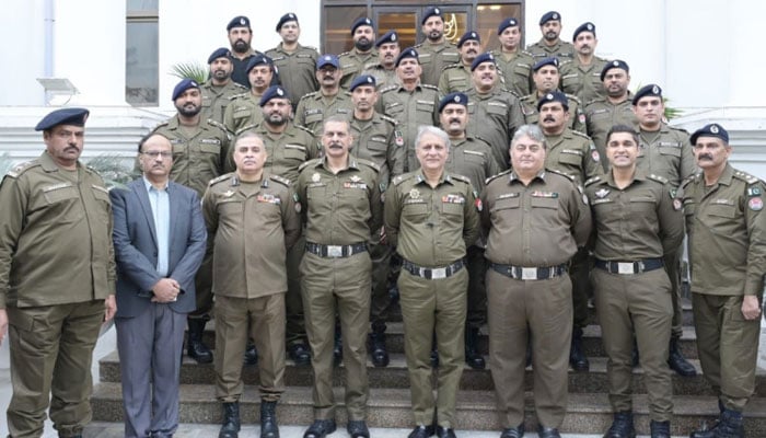 IGP Punjab, Dr Usman Anwar (4th right) in a group photo along with prompted police officers at the Central Police Office Lahore on December 22, 2024. — Facebook@PunjabPolicePakistanOfficial