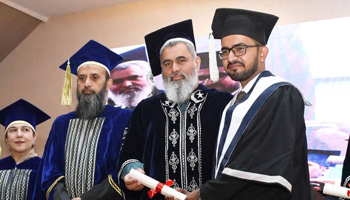 Vice Chancellor LUMHS Prof Dr Ikram Din Ujjan (centre) awards a degree to a graduate during the first convocation of Bilawal Medical College for Boys at Liaquat University of Medical and Health Sciences (LUMHS) Jamshoro, on December 21, 2024. — Facebook@MediaCell Lumhs