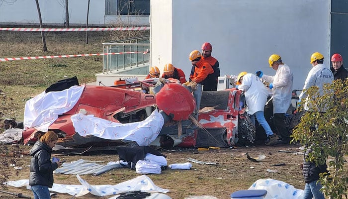 Police forensic experts examine the wreckage of an ambulance helicopter after it collided with a hospital building and crashed into the ground, in Mugla, Turkey, December 22, 2024. — Reuters