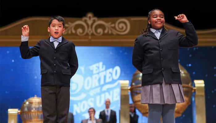 Children call out winning numbers in Spains El Gordo lottery, Madrid, December 22, 2024.— Reuters