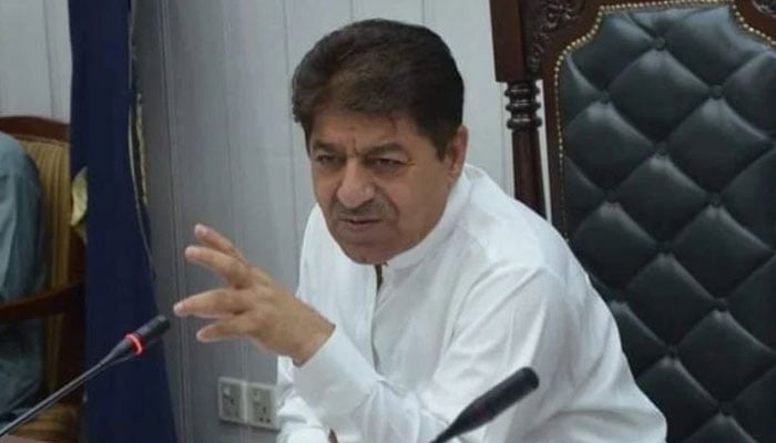 Khyber Pakhtunkhwa Minister for Food Zahir Shah Toru gestures as he speaks in a meeting. — APP/File