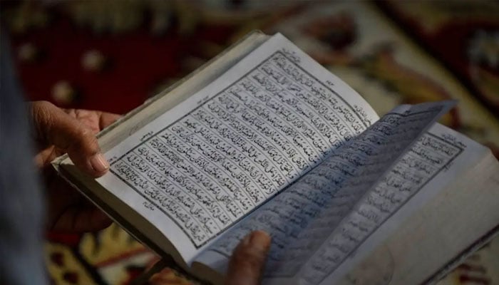 A representational image of a man reading the holy Quran. — Reuters/File