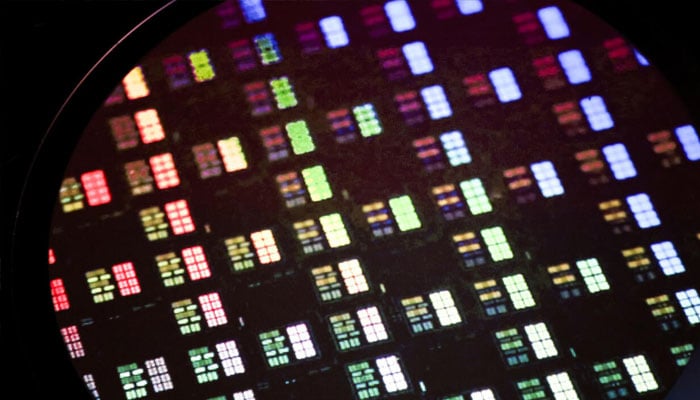 Microcontroller chips can be seen in a lab. —AFP/File