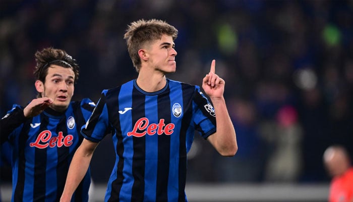 Charles De Ketelaere, seen here celebrating after scoring a penalty against Real Madrid on December 10, netted a brace for Atalanta against Empoli. —AFP/File