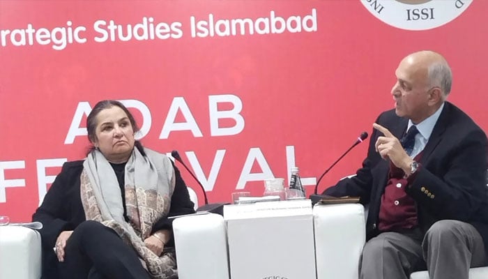 Politician Mushahid Hussain (right) and journalist Nasim Zehra seen at ninth ‘Adab Festival Pakistan’ . — Facebook@nomadartcentr/File