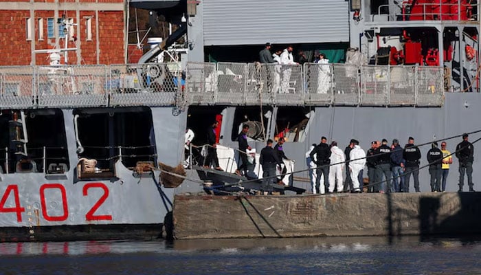 Migrants disembark from the Italian navy ship Libra carrying migrants that arrived in Albania as part of a deal with Italy to process thousands of asylum-seekers caught near Italian waters, in Shengjin, Albania, November 8, 2024. — Reuters