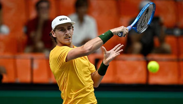 Australias Max Purcell in action during his doubles match with Matthew Ebden against Frances Pierre-Hugues Herbert and Edouard Roger. — Reuters/File