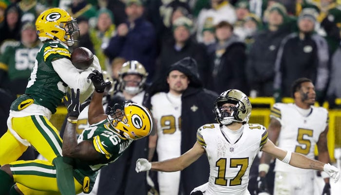 Green Bay Packers safety Zayne Anderson breaks up a pass intended for New Orleans Saints wide receiver Dante Pettis (right) at Lambeau Field. Mandatory. — Reuters/File