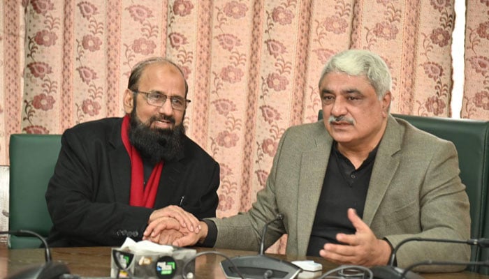 Punjab Minister for Health Khawaja Salman Rafique(right).— Facebook@SalmanRafiquePK/File