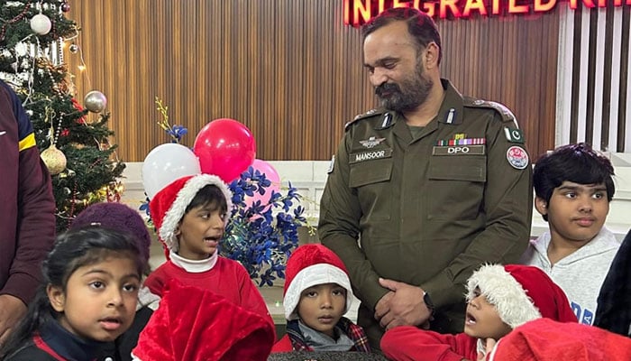 A Punjab Police official celebrating Christmas with children.— Facebook@Veharipolice1/File