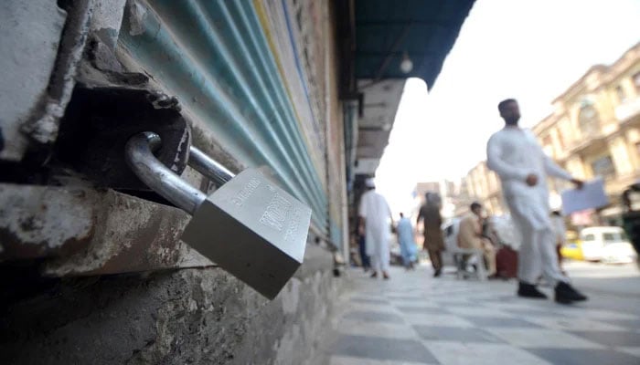 This representational image shows a view of closed shops due to a strike by traders. — INP/File