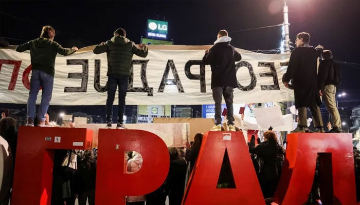 People attend a protest against government policies in Belgrade on December 22, 2024. —Reuters