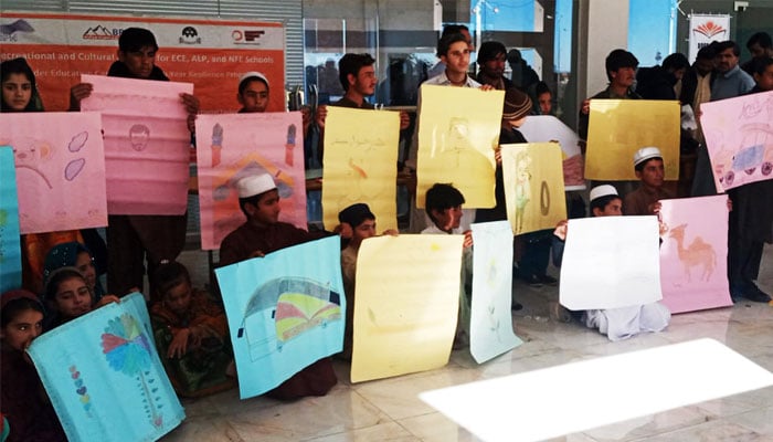 Youths belonging to four Afghan refugee-hosting districts who completed three months of skill training at the Human Resource Development Centre of the Sarhad Rural Support Programme seen in this group photo.— Facebook@RSPNPakistan/File