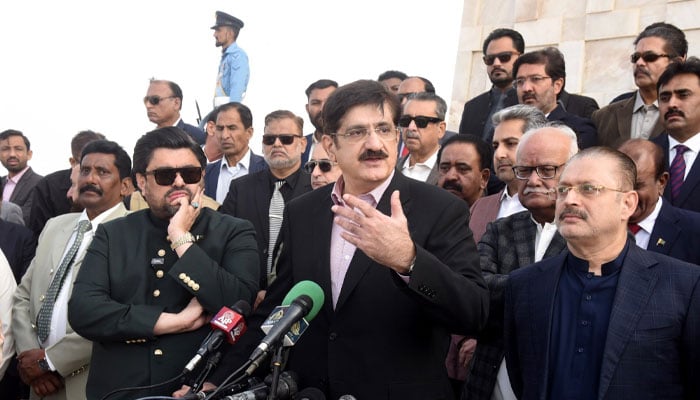 Sindh Chief Minister Syed Murad Ali Shah (Centre) and Governor Mohammad Kamran Tessori (left) address the media at Mazar-e-Quaid after paying homage to the Father of the Nation on his birth anniversary on December 25, 2024. — Facebok@SindhCMHouse