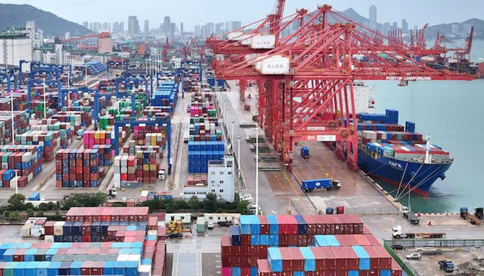 A drone view shows a cargo ship and shipping containers at the port of Lianyungang in Jiangsu province, China October 17, 2024. —Reuters