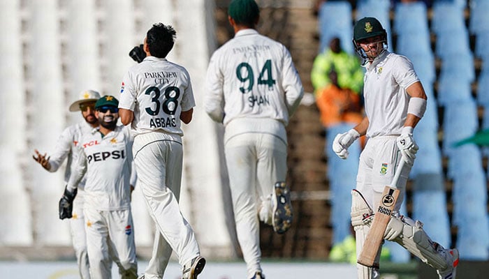 South Africa’s Tristan Stubbs (right) walks back to the pavilion after his dismissal by Pakistan’s Mohammad Abbas during the first day of the first cricket Test match between South Africa and Pakistan at SuperSport Park in Centurion on December 26. — AFP