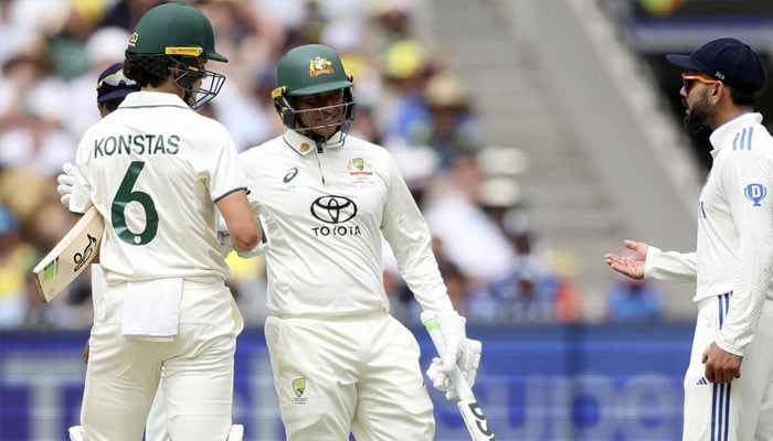 Australias Sam Konstas (left) and Indias Virat Kohli (right) bumped shoulders during the fourth Test in Melbourne. —AFP/File