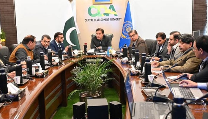 Chairman of the Capital Development Authority (CDA), Muhammad Ali Randhawa, chairs a meeting at the CDA Headquarters to review progress on sector development projects on Dec 26, 2024. — Facebook@cda.isb.pk