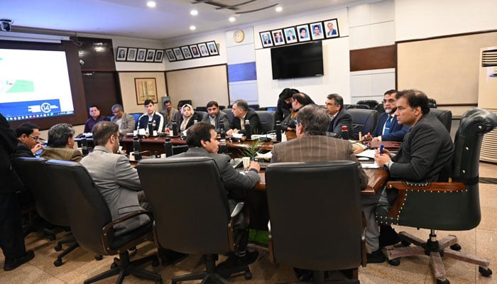 Chairman of the Capital Development Authority (CDA), Muhammad Ali Randhawa, chairs a meeting at the CDA Headquarters to review progress on sector development projects on Dec 26, 2024. — Facebook@cda.isb.pk