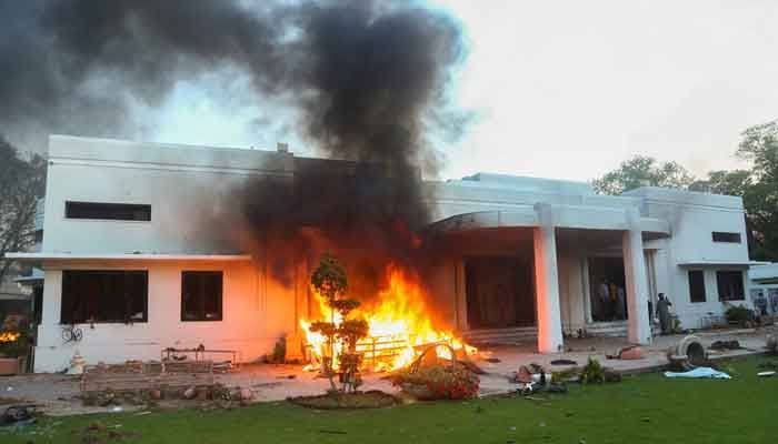 A view of a house in the cantonment area, which was set afire by supporters of Pakistans former Prime Minister Imran Khan during a protest against his arrest, in Lahore, Pakistan May 9, 2023. —Reuters