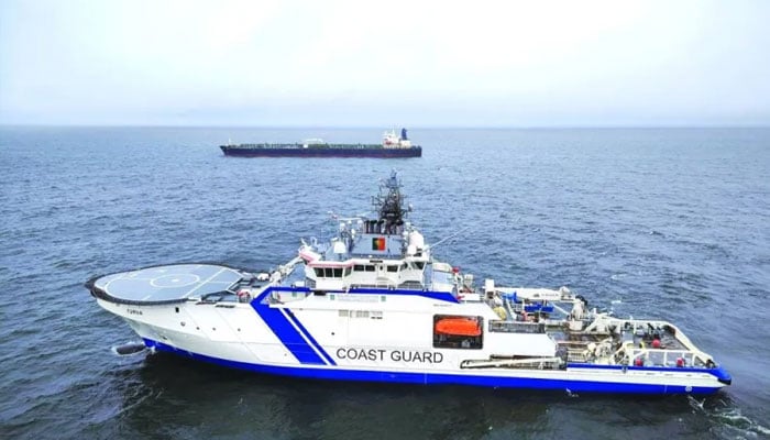 The Finnish Border Guard’s ship Turva and the oil tanker Eagle S sail on the sea outside the Porkkalanniemi, Finland. —Reuters/File