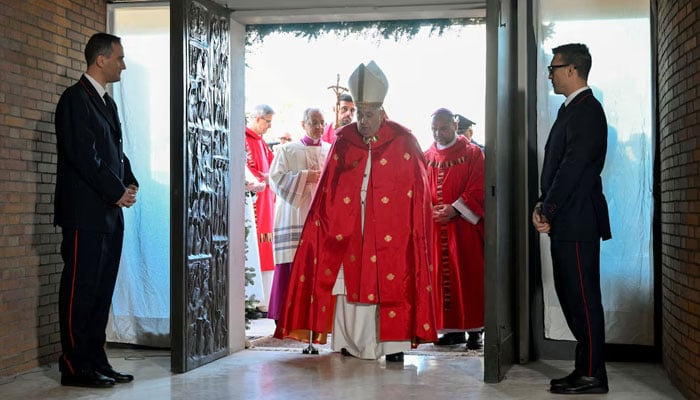 Pope Francis opens a Holy Door, one of only five that will be open during the 2025 Catholic Holy Year, at Rebibbia prison, in Rome, Italy, December 26, 2024. — Reuters