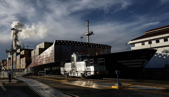 A cargo ship passes through the Miraflores locks on the Panama Canal. —AFP/File