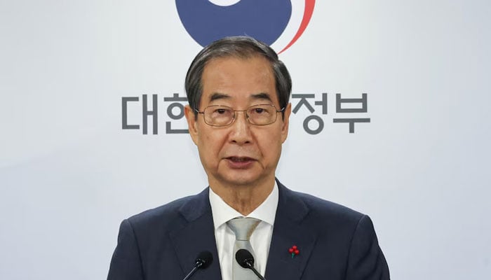 Acting South Korean President and Prime Minister Han Duck-soo delivers an address to the nation at the government complex in Seoul, South Korea, December 14, 2024. — Reuters