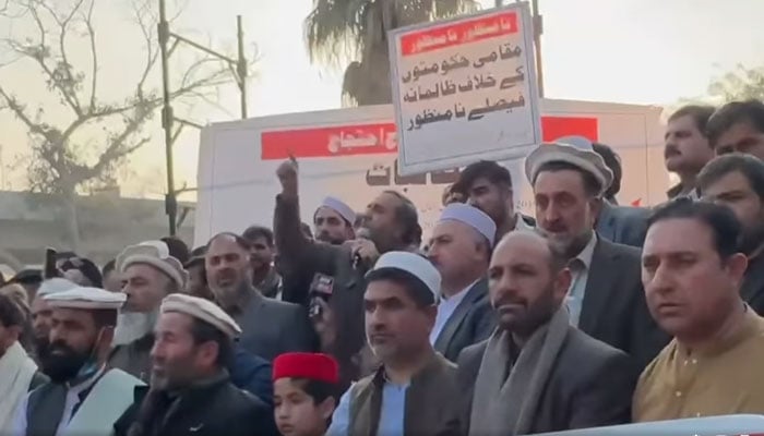 Local Government representatives from across Khyber Pakhtunkhwa are seen protesting while carrying placards and banners inscribed with their demands on Dec 26, 2024. — Screengrab via Facebook@HimayatMayaar