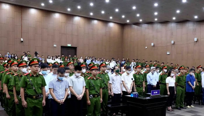 Officials and culprits seen in a Vietnam court.— Reuters/File