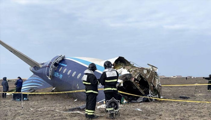 Emergency specialists work at the crash site of an Azerbaijan Airlines passenger plane near the city of Aktau, Kazakhstan December 25, 2024. — Reuters