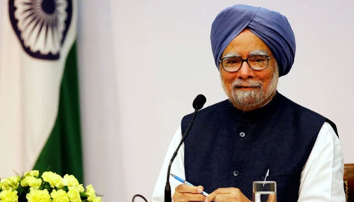 Indias then-prime minister Manmohan Singh smiles during a news conference in New Delhi, India January 3, 2014. — Reuters