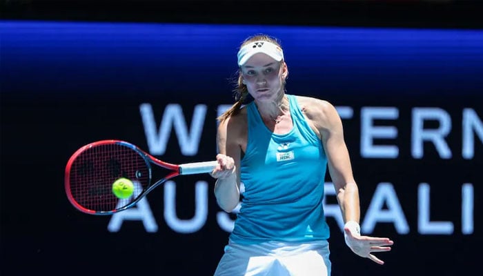 Elena Rybakina hits a return during her womens singles match at the United Cup on December 27, 2024.—AFP