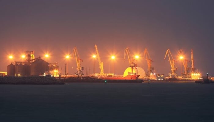 Ships and cranes are seen at the seaport of Aktau, Kazakhstan, on November 13, 2021. —Reuters