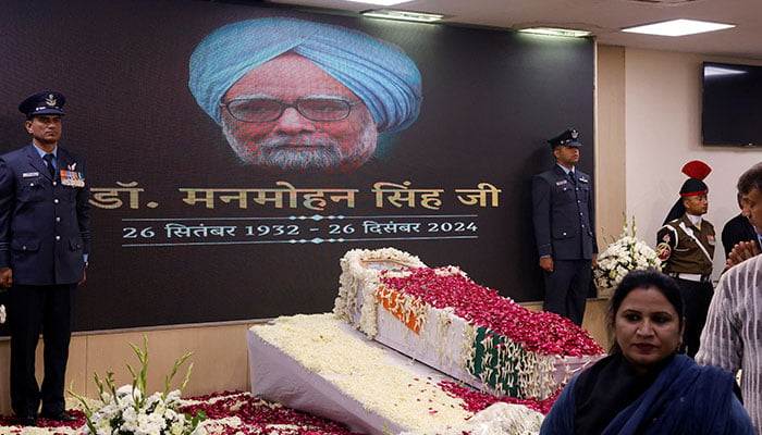 People arrive to pay their respect to Indias former PM Manmohan Singh at the Congress party’s headquarters in New Delhi, India on December 28, 2024. — Reuters