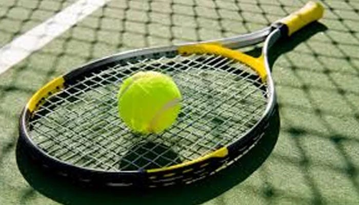 A representational image of tennis ball and racket. — APP/File