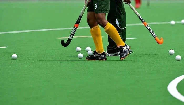 A representational image showing hockey players engaged in on-field practice. — AFP/File