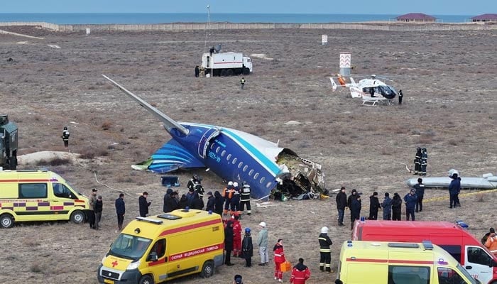 A drone view shows emergency specialists working at the crash site of an Azerbaijan Airlines passenger plane near the city of Aktau, Kazakhstan December 25, 2024. — Reuters