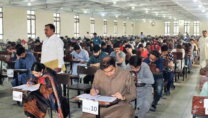 Representational image of students solving papers during test. — Facebook@kemulahore/File