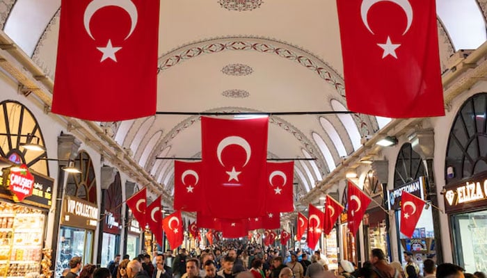 People stroll through the historic Grand Bazaar, a popular tourist attraction and one of the countrys most important economic venues, in Istanbul, Turkey, October 22, 2024.— Reuters