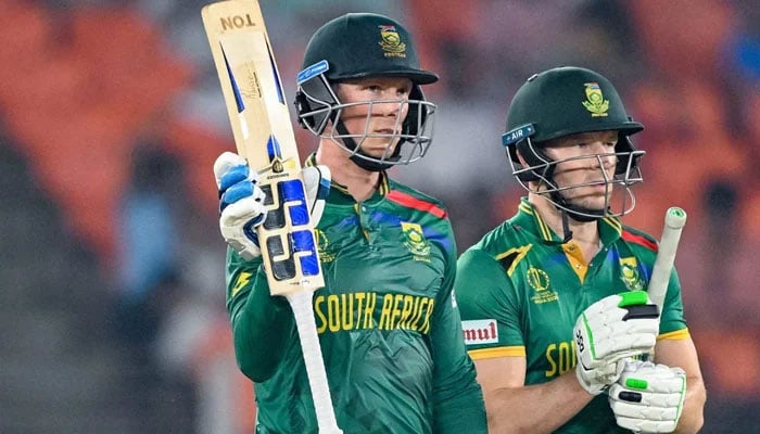 South Africas Rassie van der Dussen (left) celebrates scoring half-century during ICC Mens Cricket World Cup 2023 match against Afghanistan on November 10, 2023. — AFP